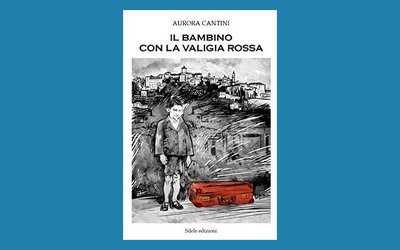 Il bambino con la valigia rossa